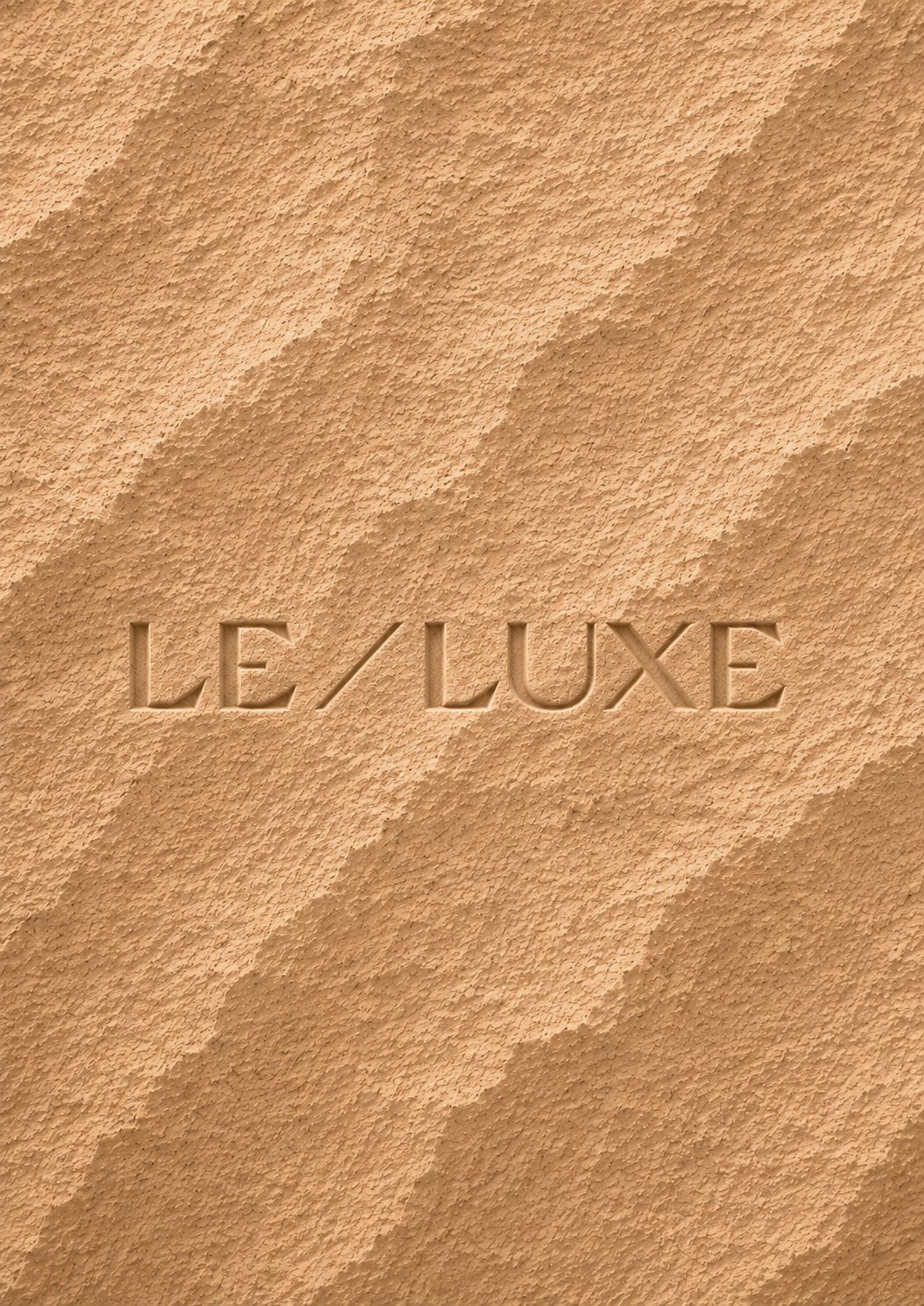 Le / Luxe embossed in desert sand